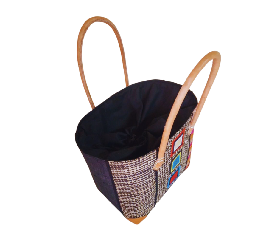 NatsNco handmade raffia, women,pink basket with embroidery and leather handle & drawstring closure. Made in Madagascar