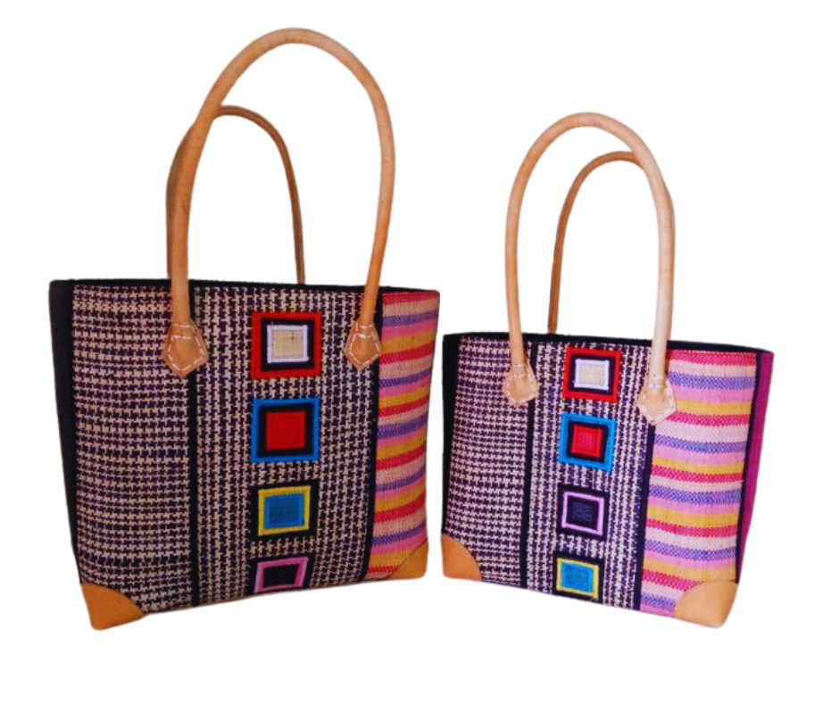NatsNco handmade raffia, women,pink basket with embroidery and leather handle & drawstring closure. Made in Madagascar