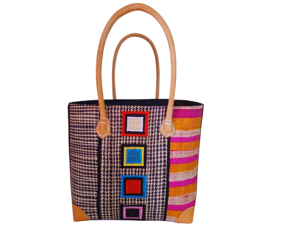 NatsNco handmade raffia, women,pink basket with embroidery and leather handle & drawstring closure. Made in Madagascar