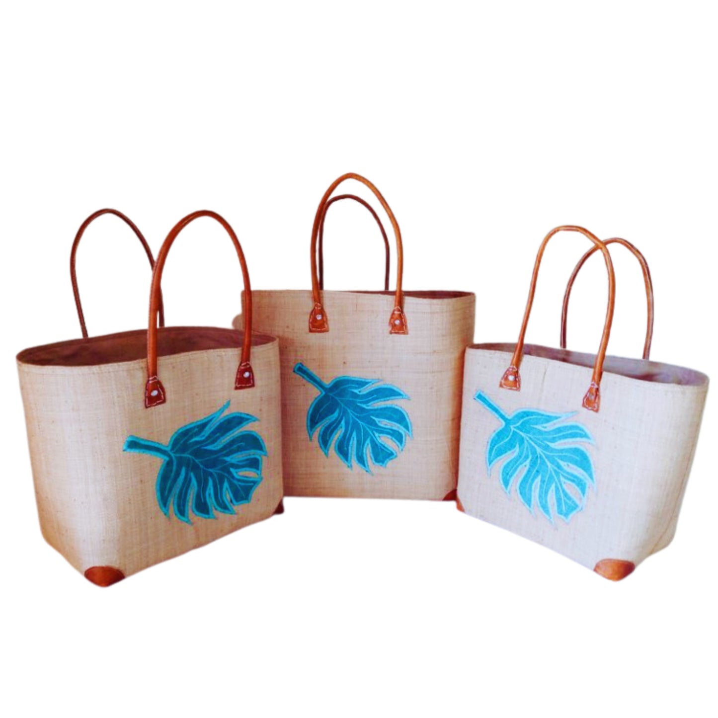 NatsNco handmade raffia, women,beige basket with turquoise leaf embroidery and leather handle & drawstring closure. Made in Madagascar