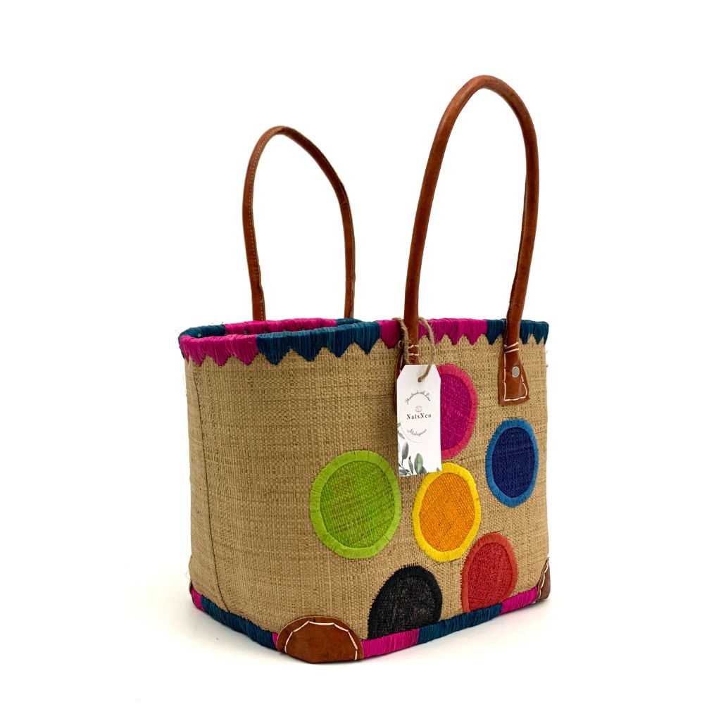 The Beige Raffia baskets with dotted embroidery, inside pocket & leather handle.3 different sizes and very spacious and durable.Handmade in Madagascar with love.