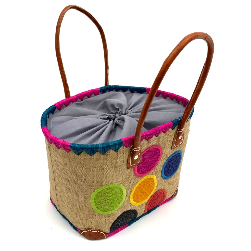 The Beige Raffia baskets with dotted embroidery, inside pocket & leather handle.3 different sizes and very spacious and durable.Handmade in Madagascar with love.