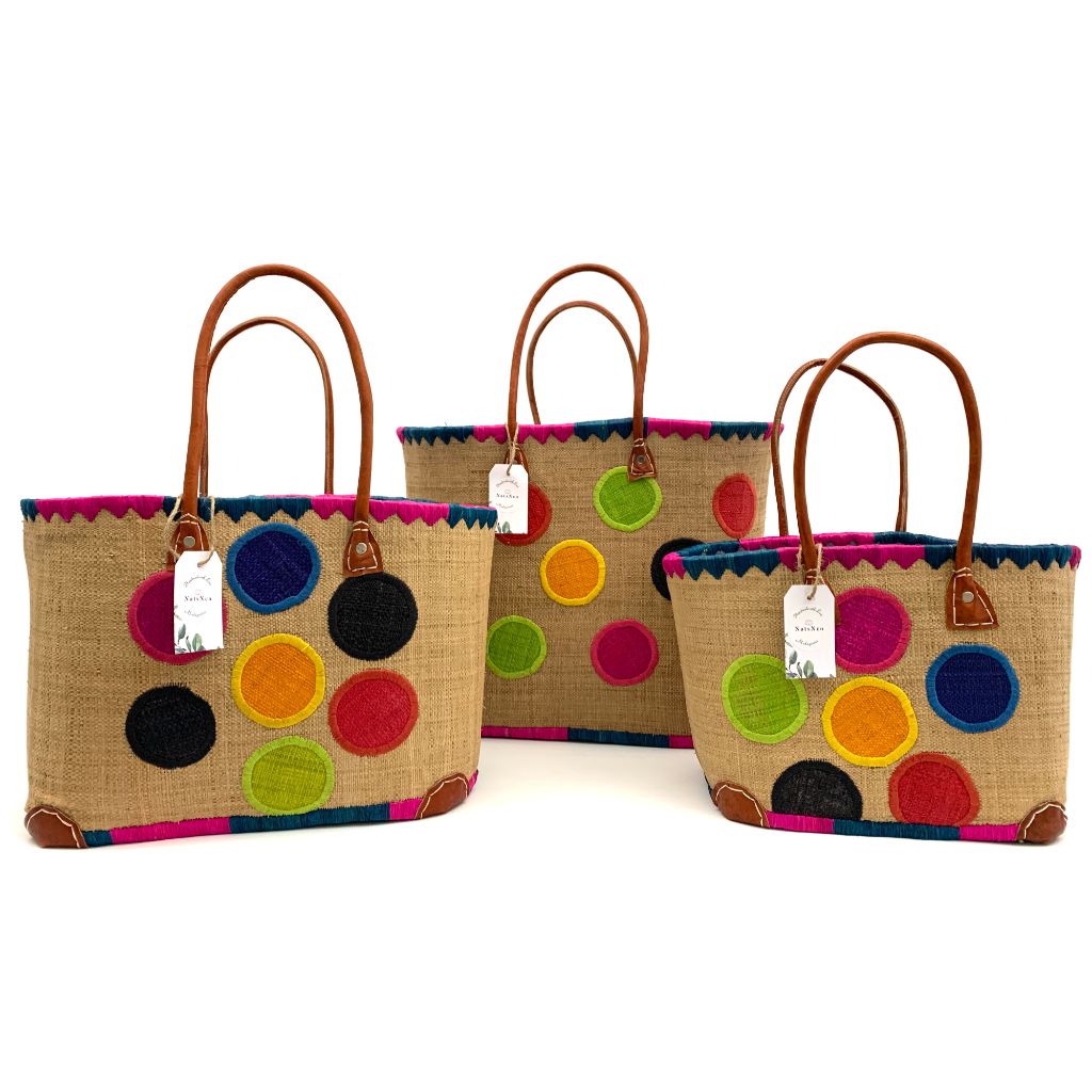 The Beige Raffia baskets with dotted embroidery, inside pocket & leather handle.3 different sizes and very spacious and durable.Handmade in Madagascar with love.