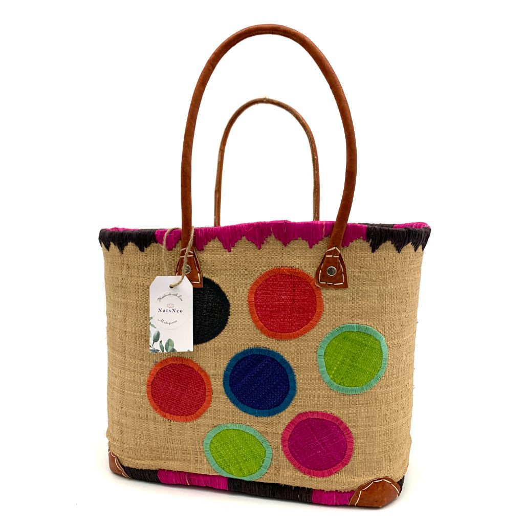 The Beige Raffia baskets with dotted embroidery, inside pocket & leather handle.3 different sizes and very spacious and durable.Handmade in Madagascar with love.