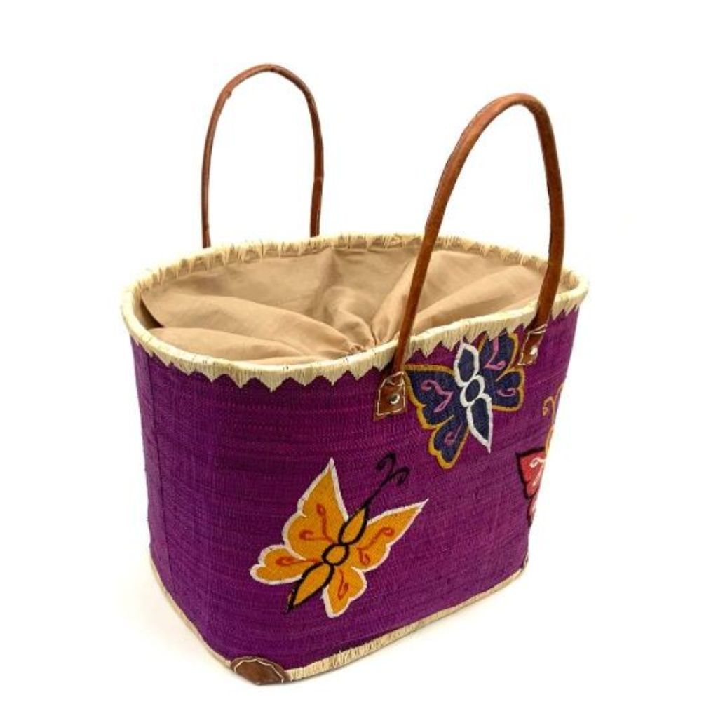 Purple raffia basket for women with butterfly embroidery and leather handle. Handmade with love in Madagascar.