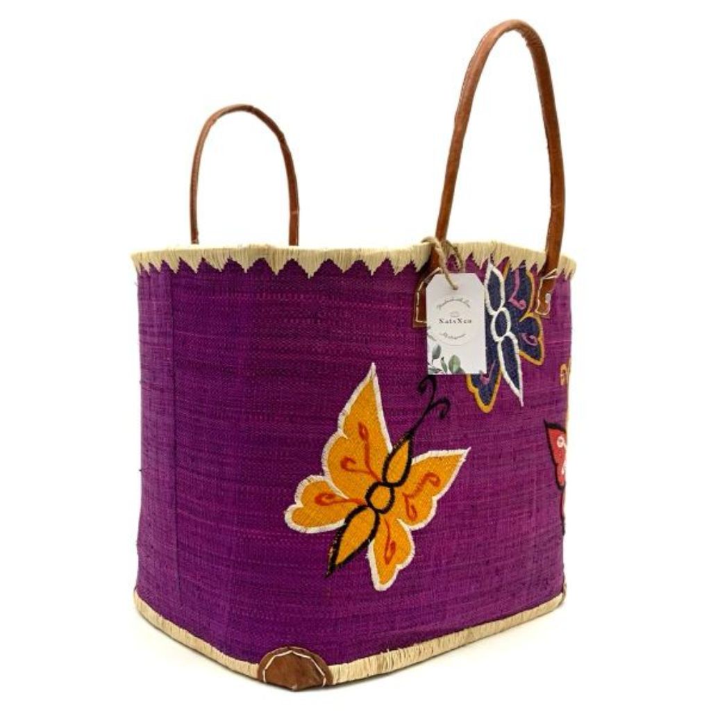 Purple raffia basket for women with butterfly embroidery and leather handle. Handmade with love in Madagascar.