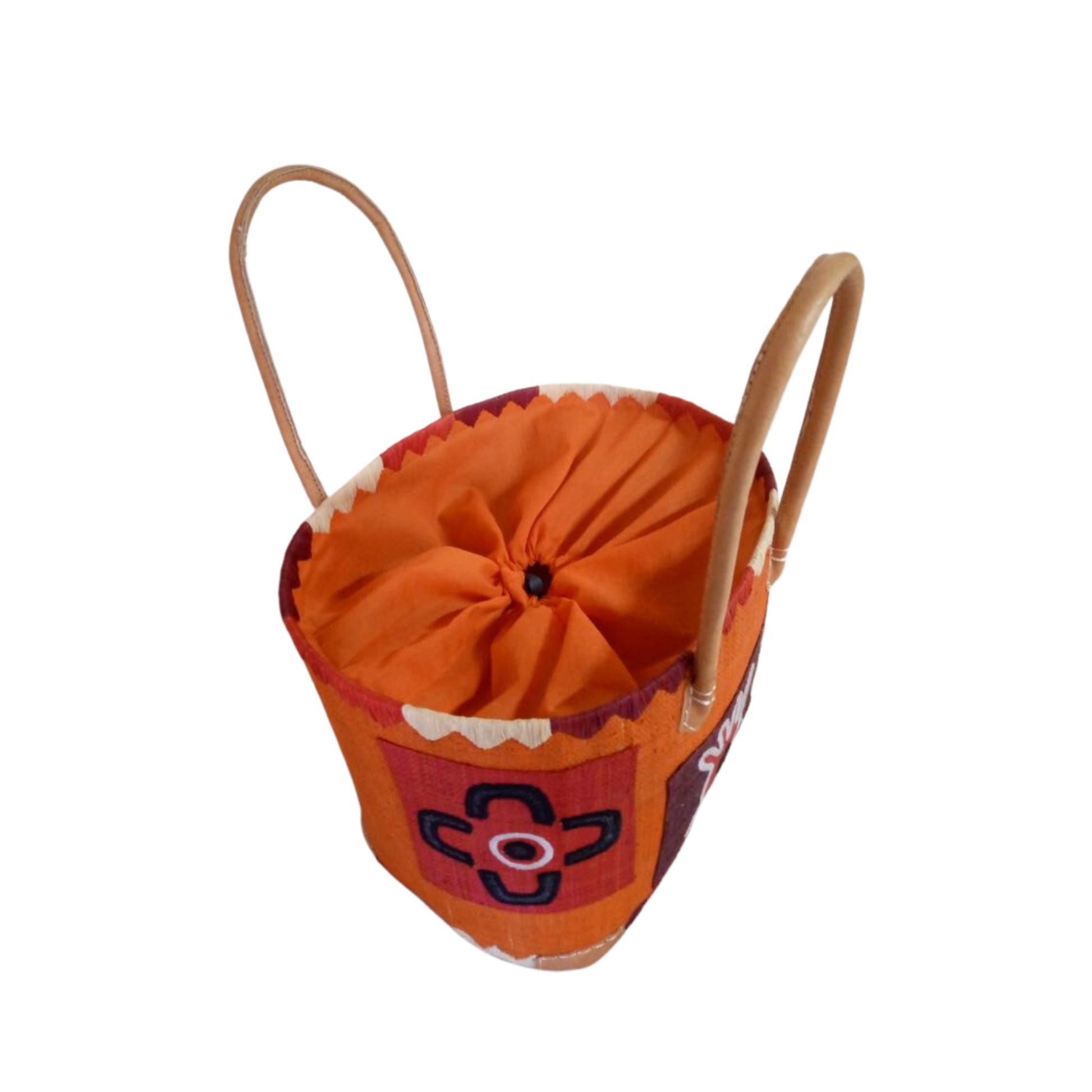 NatsNco handmade raffia women orange basket with pattern embroidery and leather handle & drawstring closure. Made in Madagascar