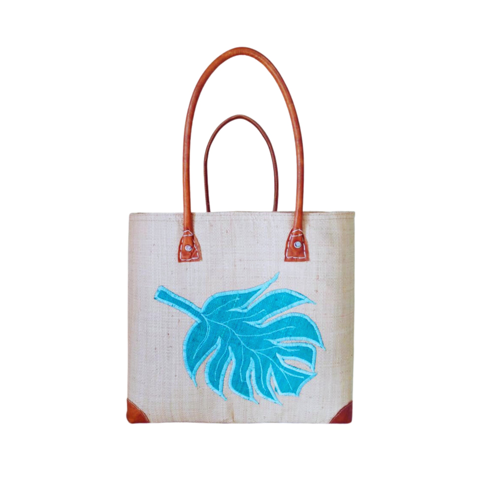 NatsNco handmade raffia, women,beige basket with turquoise leaf embroidery and leather handle & drawstring closure. Made in Madagascar