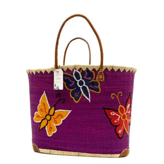 Purple raffia basket for women with butterfly embroidery and leather handle. Handmade with love in Madagascar. 