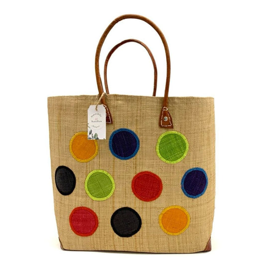 handmade beige raffia women basket with colourful dots and leather handle. Made in  Madagascar 